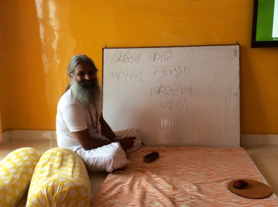 Yogi Sivadas writes our names in Sanskrit